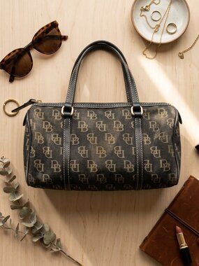 Dooney & Bourke Black & Gold Monogram Mini Barrel Bag